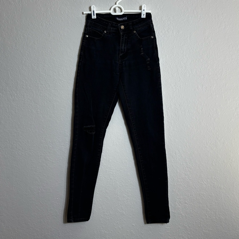 Women's Black Ripped Jeans. Size 0